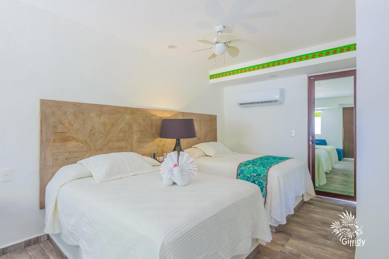 Hotel Paradise Suites Исла-Мухерес Экстерьер фото