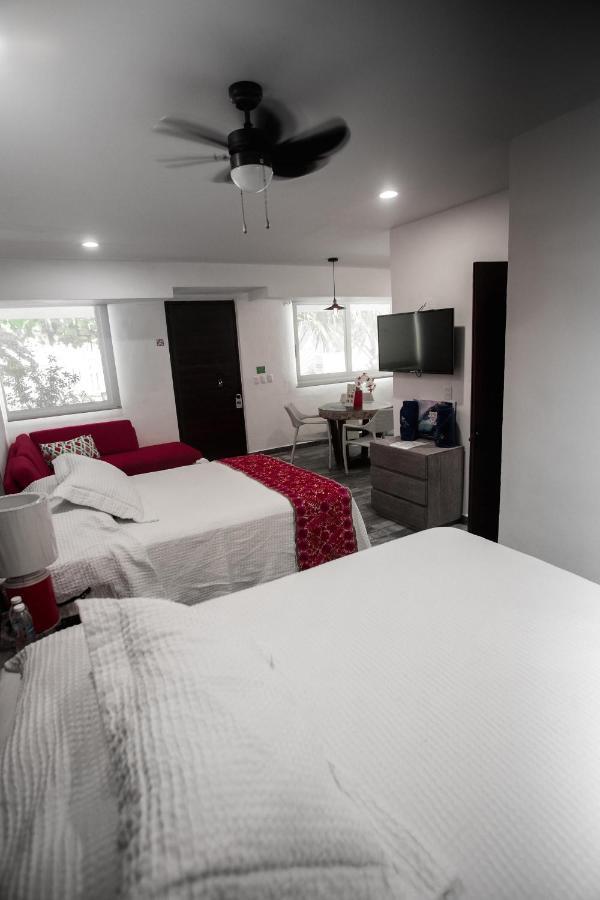 Hotel Paradise Suites Исла-Мухерес Экстерьер фото